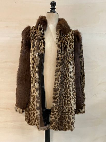 Manteau de fourrure léopard. 
Taille environ...