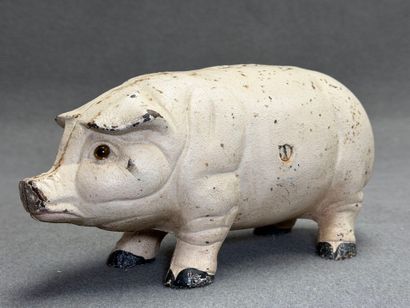 Tirelire cochon en fonte.
Début XX°
L: 26...