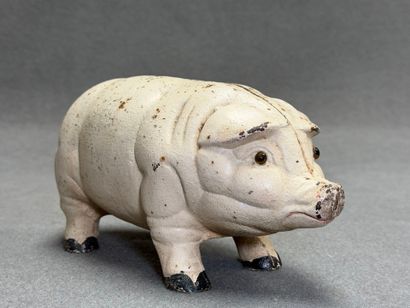 Tirelire cochon en fonte.
Début XX°
L: 26...