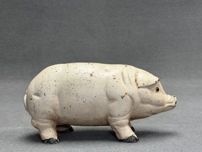 Tirelire cochon en fonte.
Début XX°
L: 26...