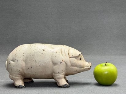 Tirelire cochon en fonte.
Début XX°
L: 26...