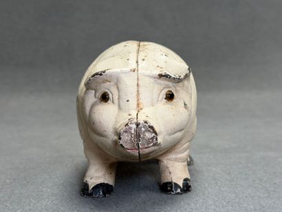 Tirelire cochon en fonte.
Début XX°
L: 26...