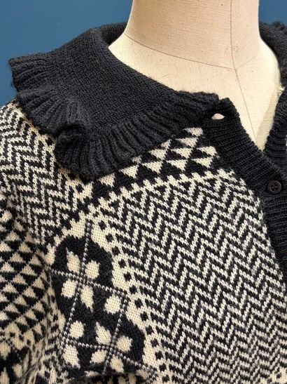 KENZO
Robe pull en laine maille jacquart.
L:...