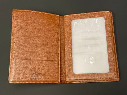 Louis VUITTON
Porte-feuille en toile monogrammé...