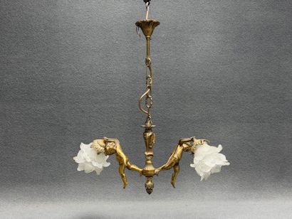 Lustre en bronze aux angelots 1900
H. :55...