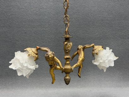 Lustre en bronze aux angelots 1900
H. :55...