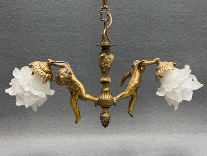 Lustre en bronze aux angelots 1900
H. :55...