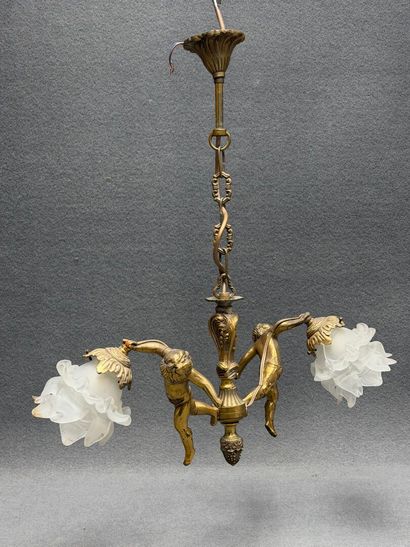 Lustre en bronze aux angelots 1900
H. :55...