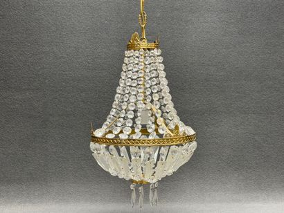 Petit lustre à rangs de perles de verre facetées
H:...