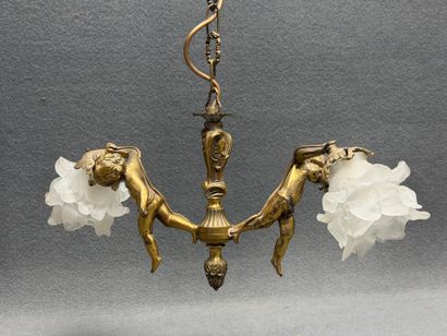 Lustre en bronze aux angelots 1900
H. :55...