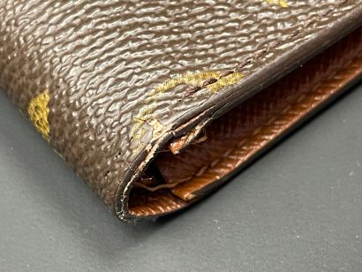 Louis VUITTON
Porte-feuille en toile monogrammé...