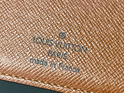 Louis VUITTON
Porte-feuille en toile monogrammé...