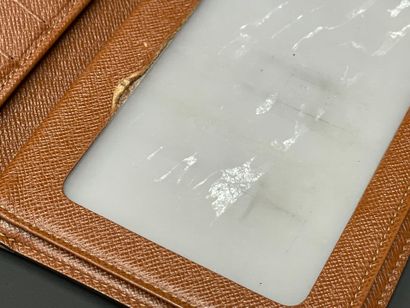 Louis VUITTON
Porte-feuille en toile monogrammé...