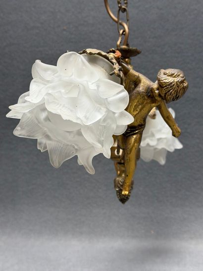 Lustre en bronze aux angelots 1900
H. :55...