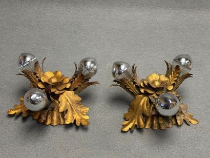 Deux appliques en tôle doré à trois spots....