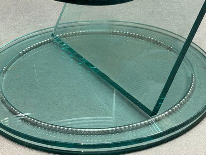 Support de télévision pivotant en verre.
avec...