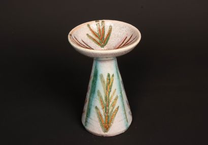 ACCOLAY. 
Bougeoir en céramique émaillée.
H....