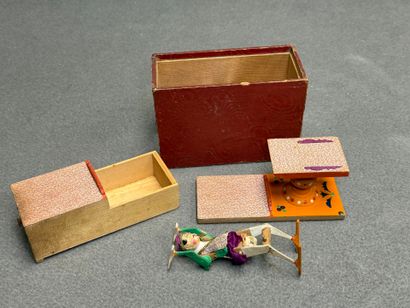 Jouet asiatique en bois. 
11 x 16 x 7 cm...