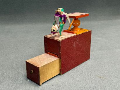 Jouet asiatique en bois. 
11 x 16 x 7 cm...