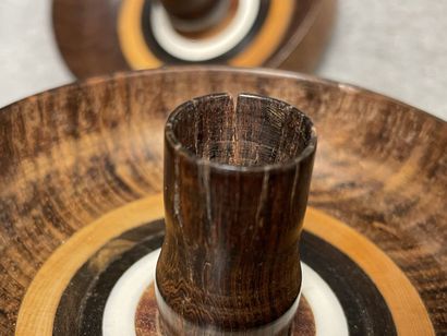 Deux petits bougeoirs de voyage en bois tourné,...
