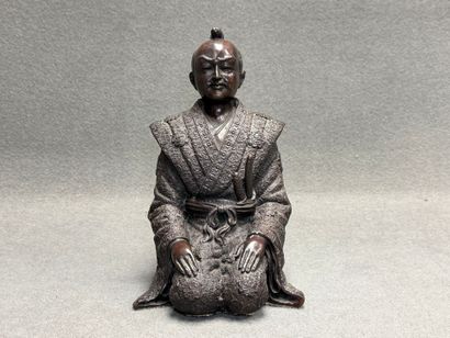 Samouraï à genoux. 
Sculpture décorative...