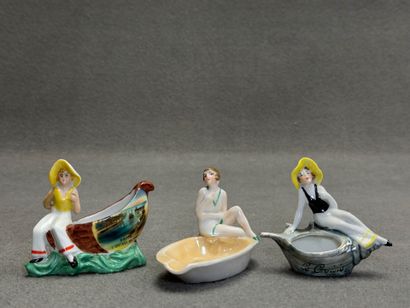 Ensemble de trois petits vide-poche en porcelaine.
H:...