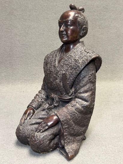 Samouraï à genoux. 
Sculpture décorative...
