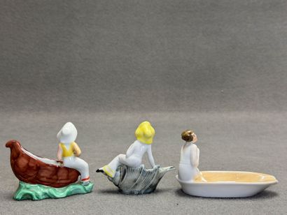 Ensemble de trois petits vide-poche en porcelaine.
H:...