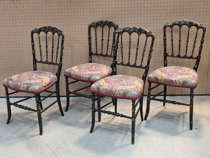 Suite de quatre chaises en bois noirci, Napoléon...