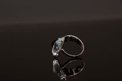 Modern white gold ring set with a marquise-cut...