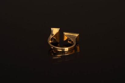 Asymmetrical yellow gold ring set with two...