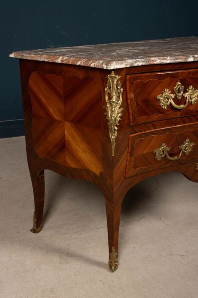 All-sided curved chest of drawers in amaranth...