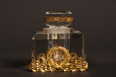 Glass inkwell and neo-classical bronze frame....