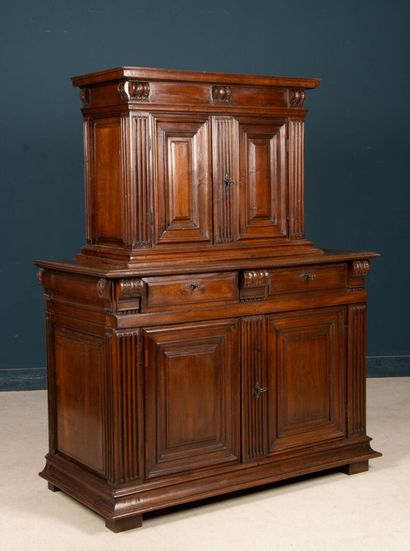 Two-part sideboard in molded walnut opening...