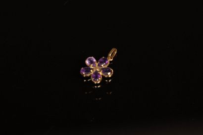 Amethyst and gold flower pendant, and two...