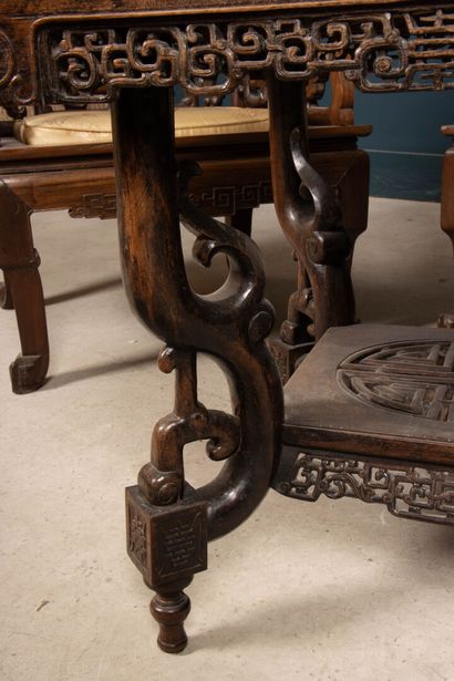 Carved exotic wood salon with three armchairs...