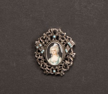 Enameled silver brooch adorned with a miniature...
