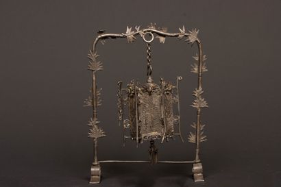 Portico supporting a miniature silver and...