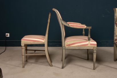Pair of carved wood armchairs, two-tone rechampi.
A...
