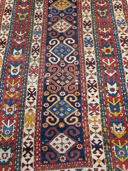 Oriental hand-woven wool rug
Hole at edge...