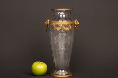 Engraved glass vase with brass frame decorated...