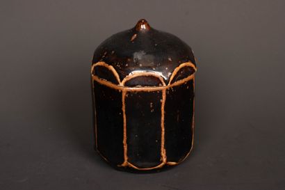 Brown-black enameled stoneware box with cut...