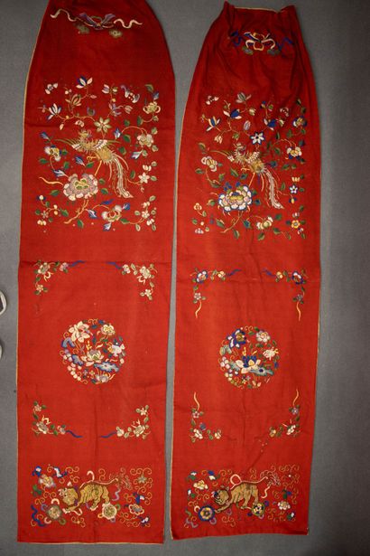 Pair of embroidered red silk curtains.
China...