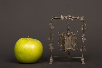 Portico supporting a miniature silver and...