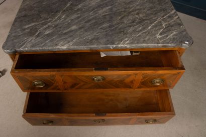 Chest of drawers in walnut with butterfly...