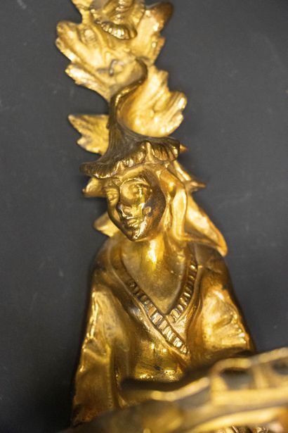 Pair of gilt bronze sconces with two asymmetrical...