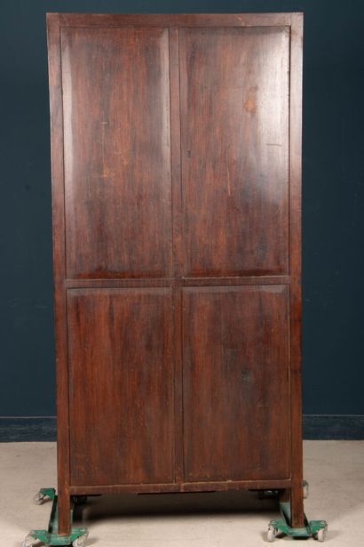 Richly carved exotic wood shelf with two...