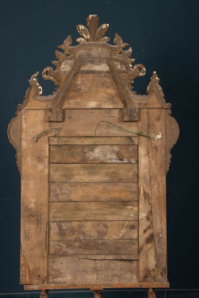 Wood and gilded stucco mirror with parecloses...
