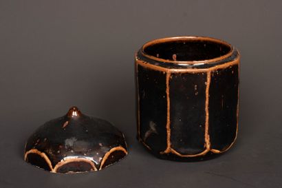 Brown-black enameled stoneware box with cut...