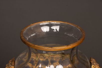 Engraved glass vase with brass frame decorated...